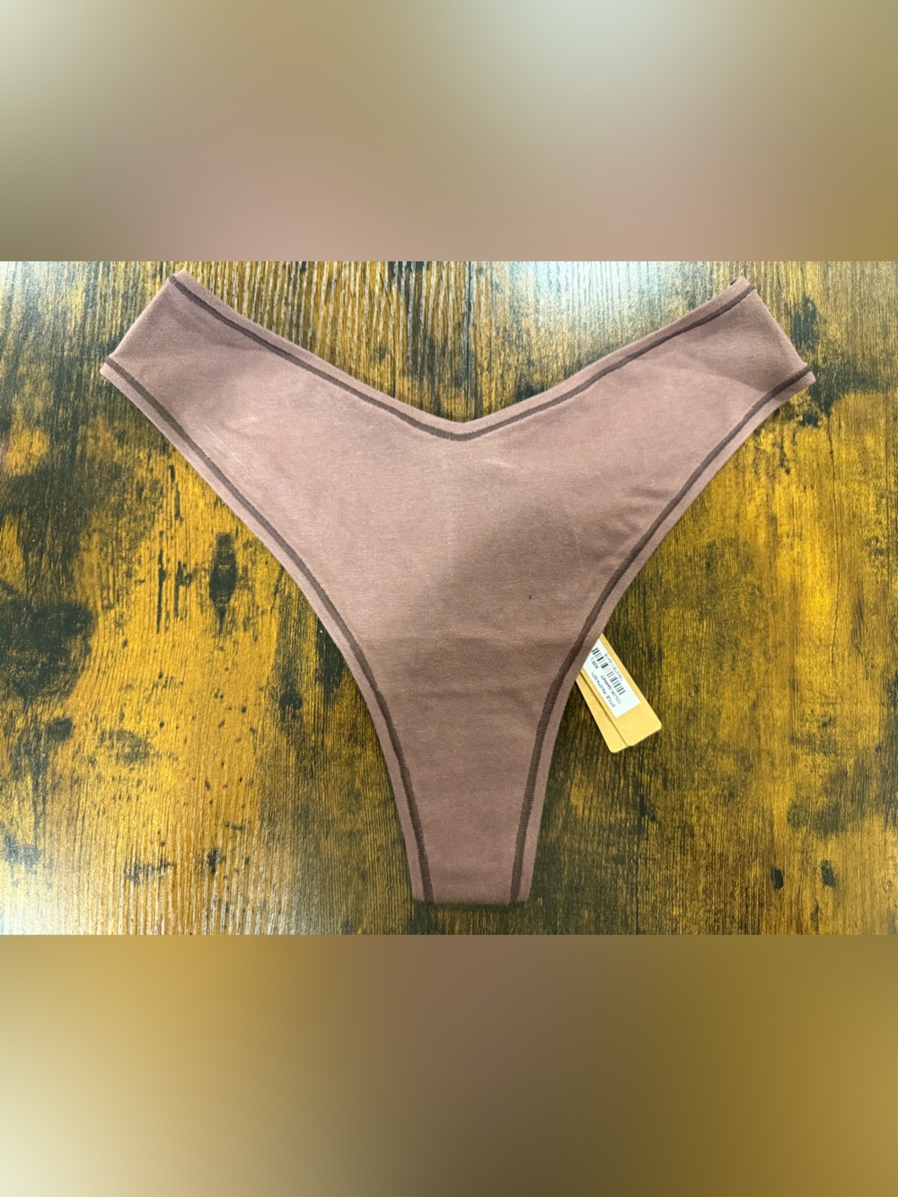 SKIMS Brown V‑cut Seamless Thong Panty